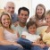 Extended family in living room smiling