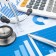 Stethoscope with financial statement, calculator, pen Stethoscope with financial statement, calculator, pen